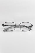 Pair of cat eye metal frame glasses with a silver frame on a white background
