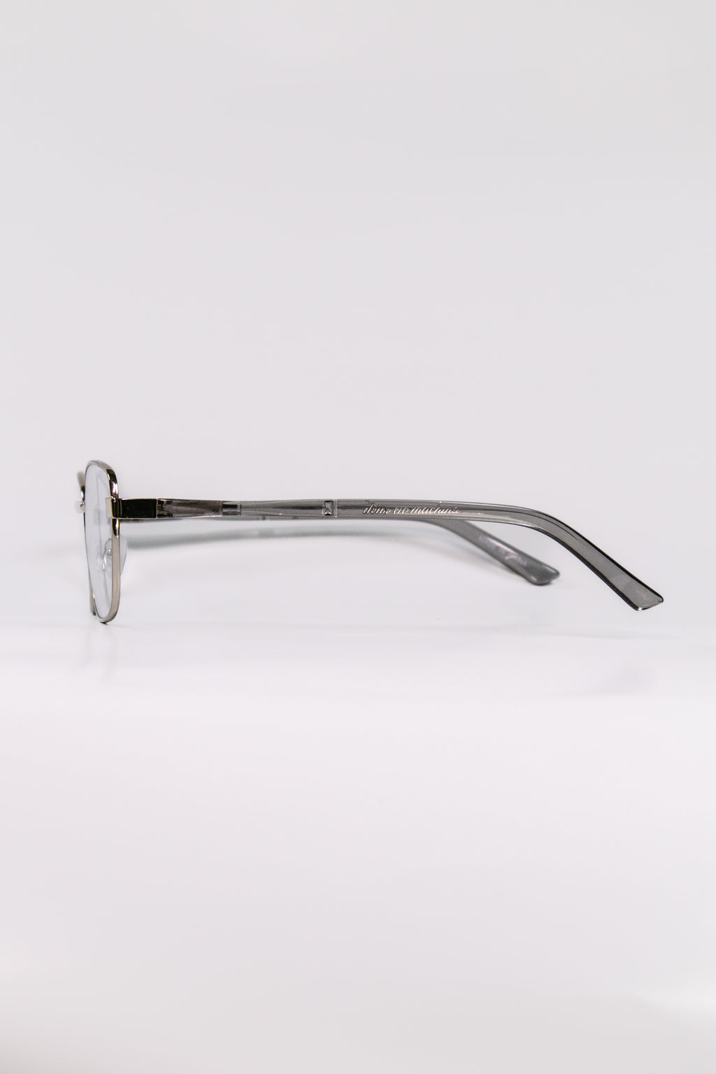 Side shot of a pair of silver glasses with metal frames
